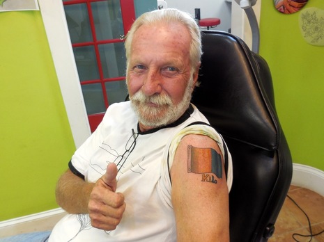 Bill Bishop w Signal K flag tat courtesy marine installers rant.jpg